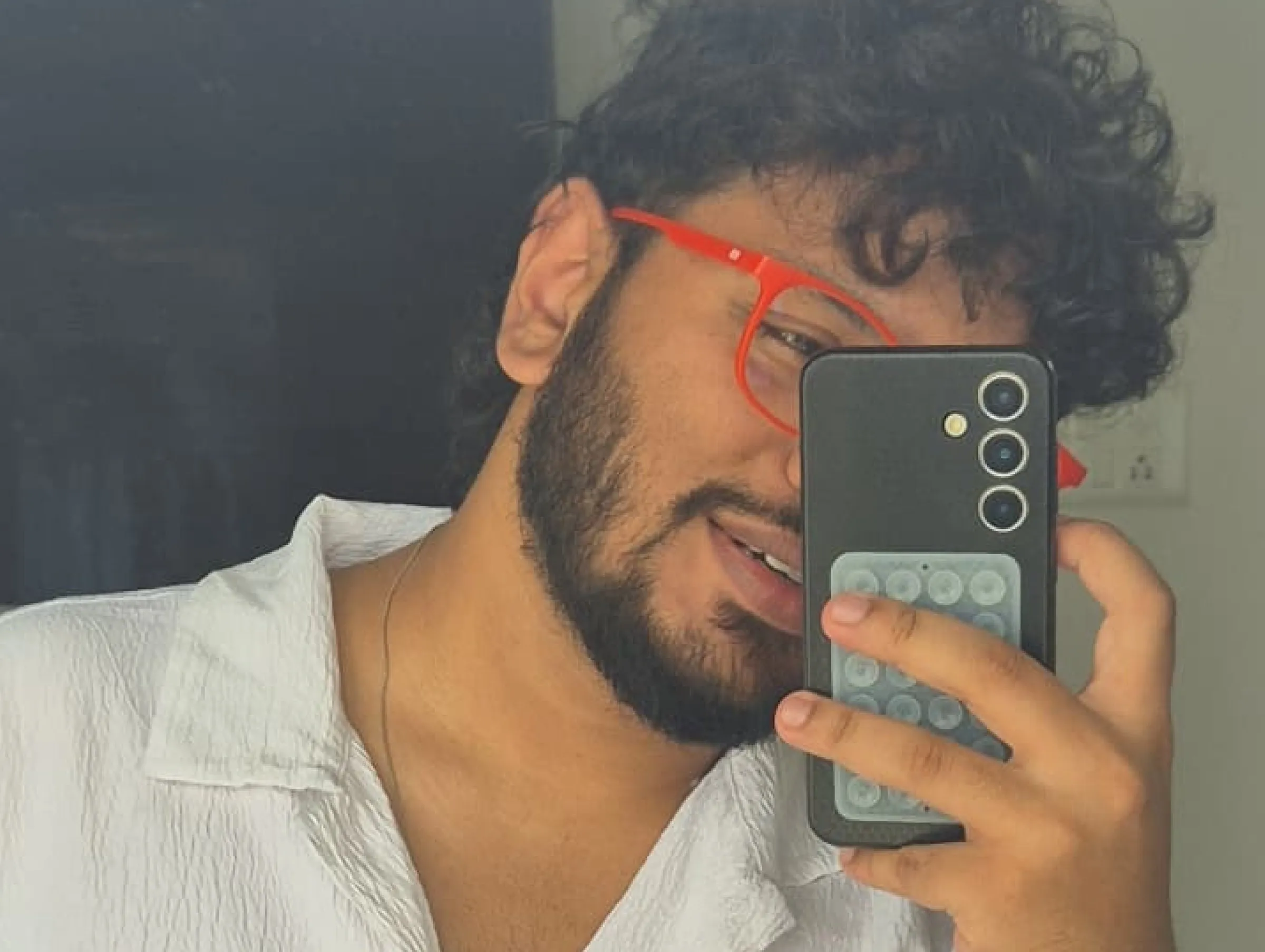 Pranesh - red glasses